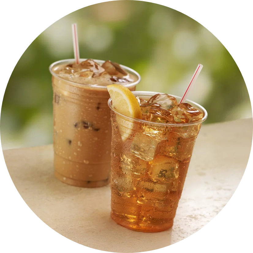 wo glasses of iced tea with lemon wedges, showcasing refreshing beverages and natural ingredients