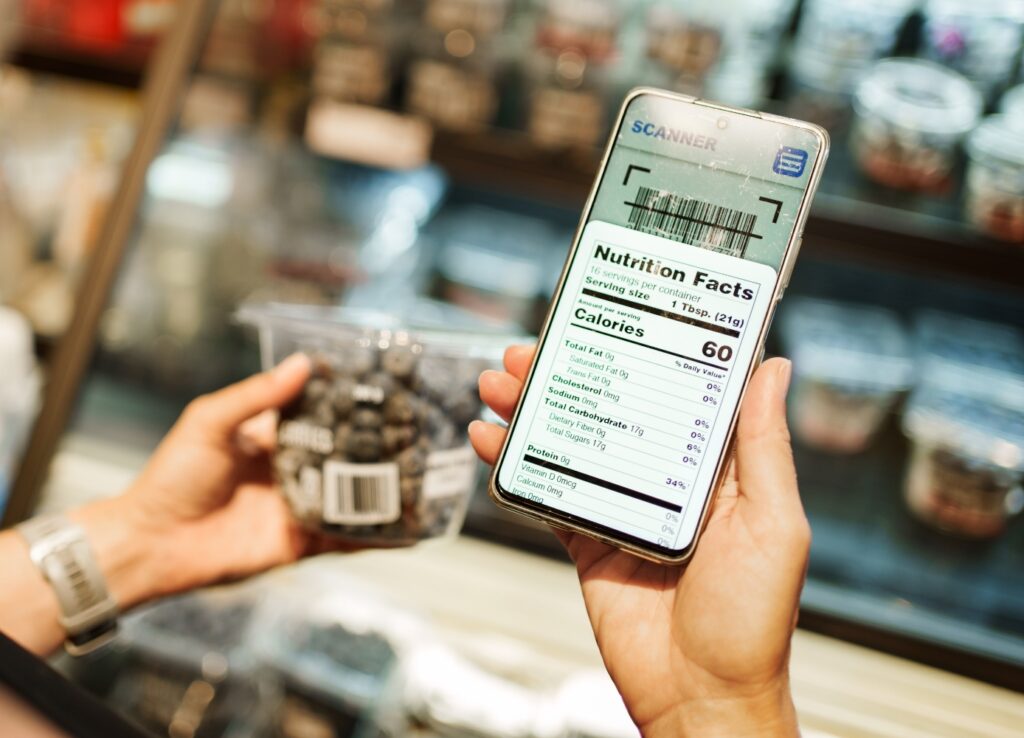 person holding a smart phone in their hand
