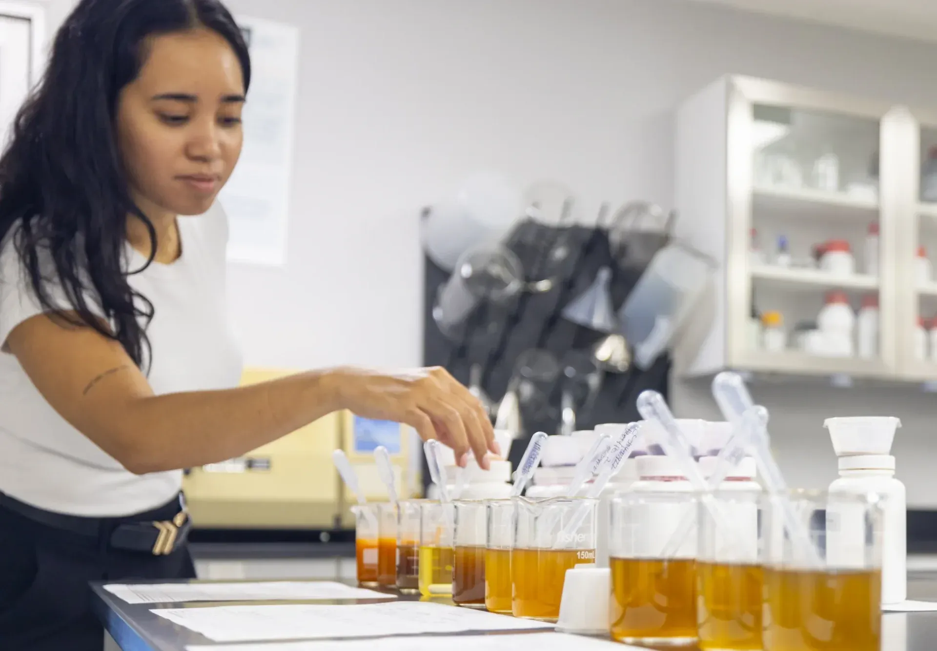 Scientists mixing and evaluating ingredients